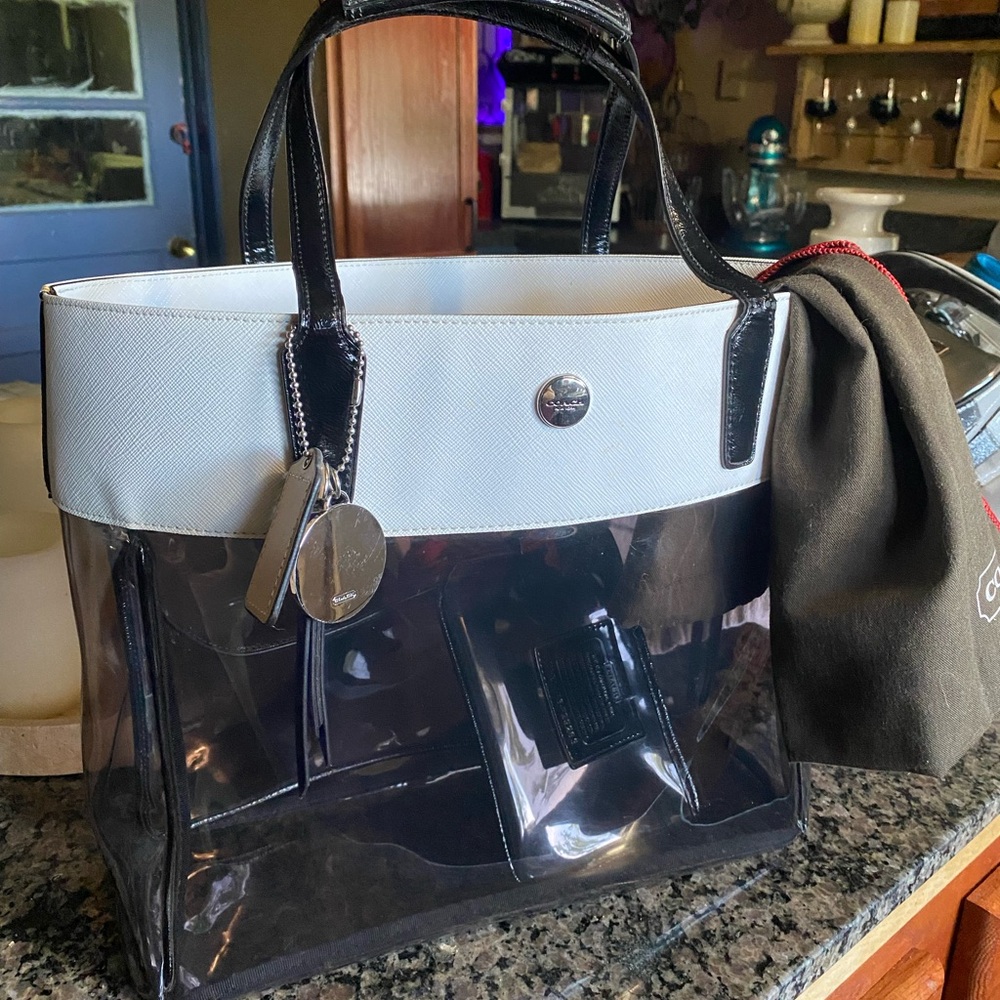 Preloved Coach PVC with leather trim, tote and wristlet with normal use